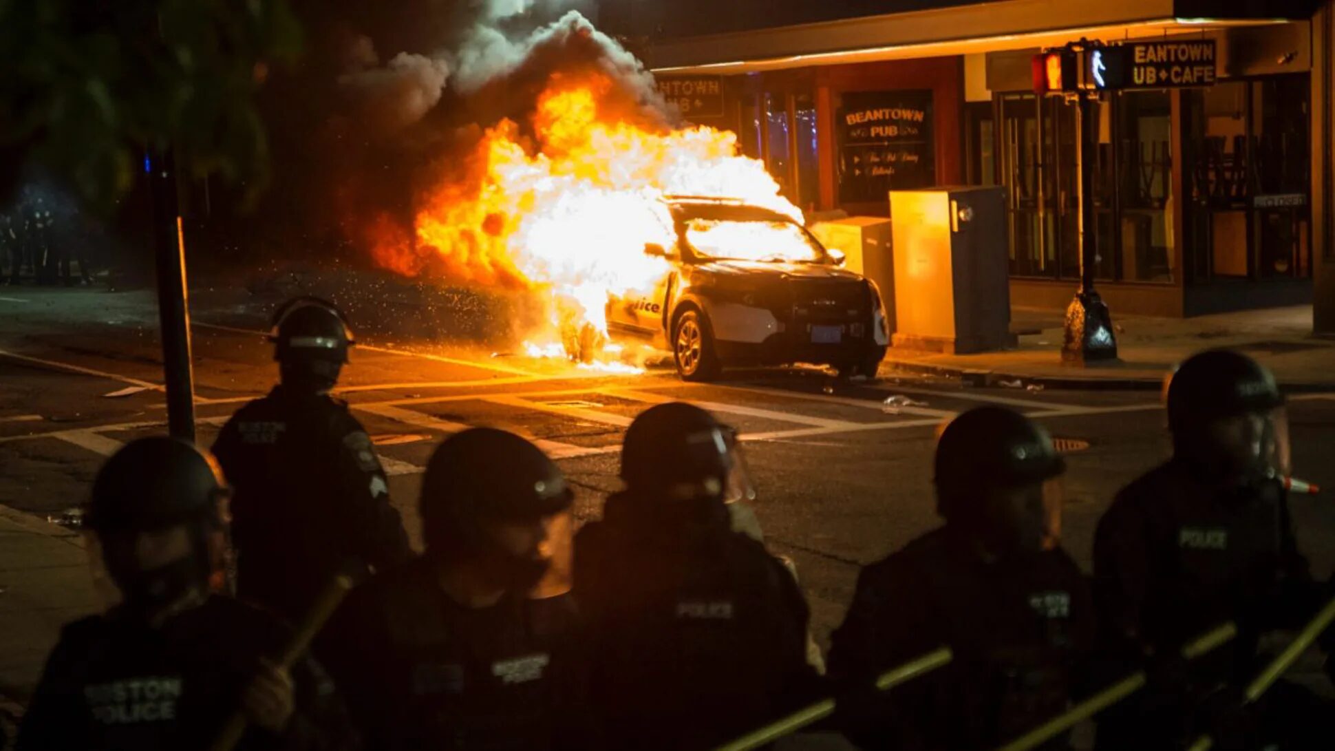 burning cop car police