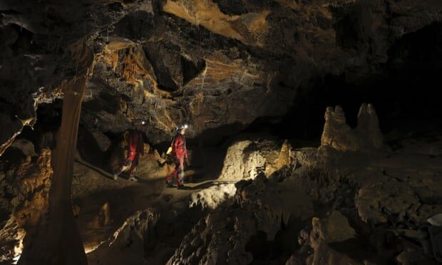 Click to enlarge Members of the team inside the cave.