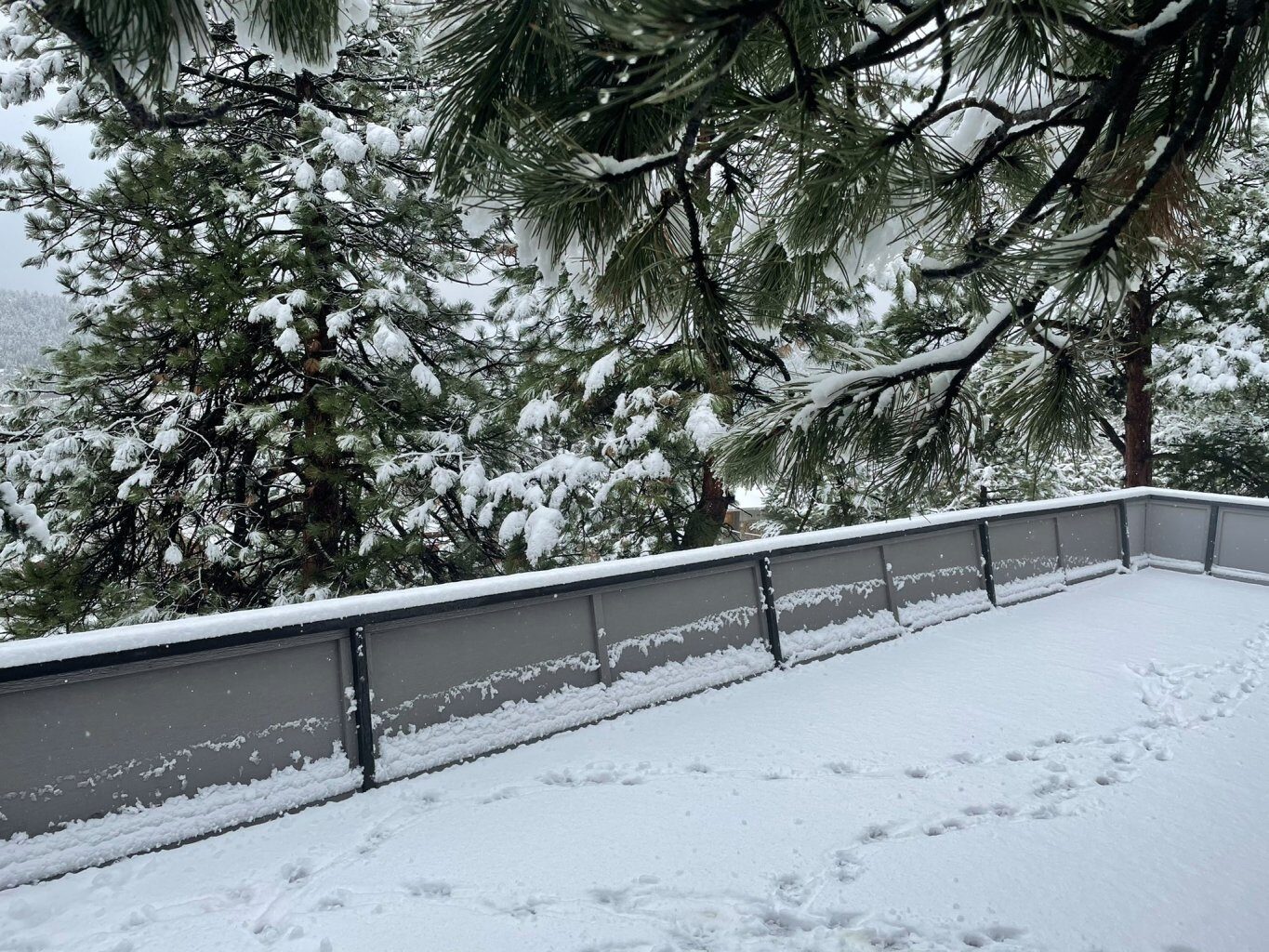A few inches of wet, sloppy snow fell early Monday in the foothills west of Denver.