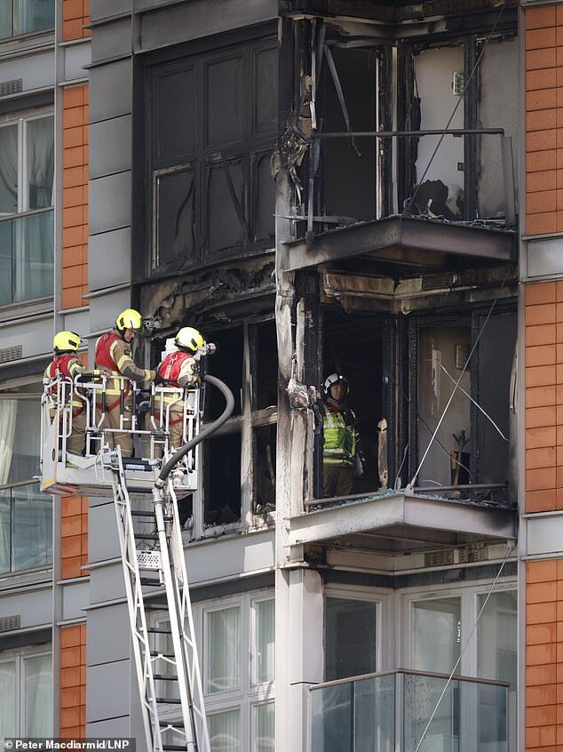 Click to enlarge London apartment fire canary wharf
