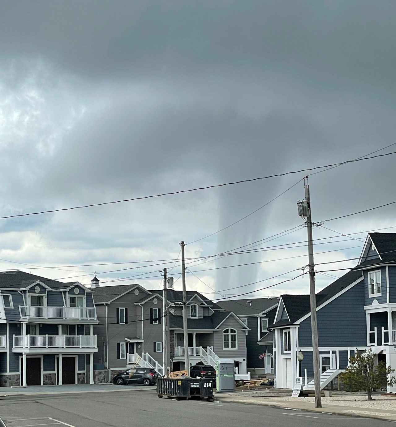 Click to enlarge A waterspout formed Saturday in Barnegat Bay, the National Weather Service said. The massive funnel-like spout can be seen here from Bayside Terrace in Seaside Heights.