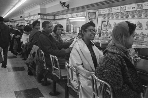 Click to enlarge Black students sit down strike