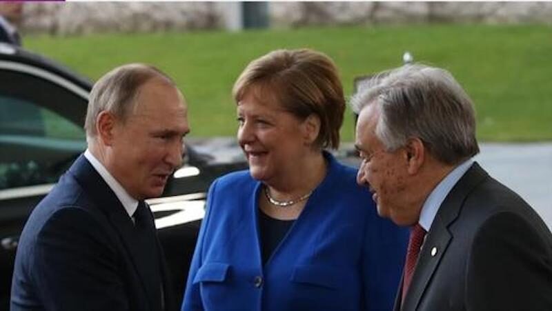 Putin Merkel and Guterres