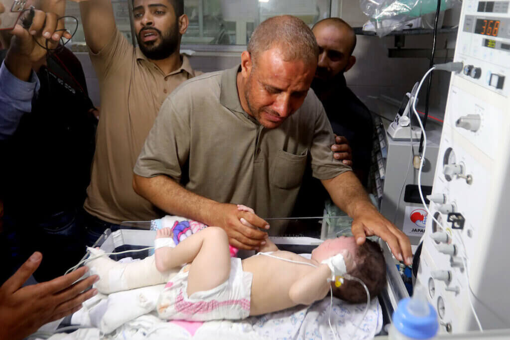 gaza bombing baby survivor greiving father