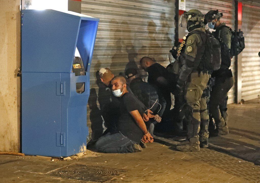 Click to enlarge palestinians detained lod violence far right israel