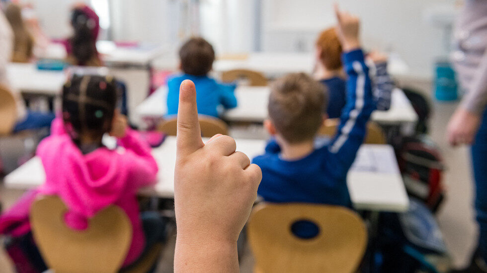school room raised hands