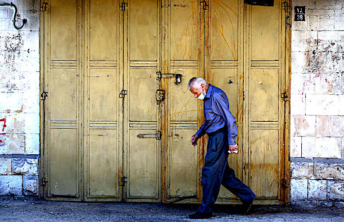 Click to enlarge Man walking Nablus