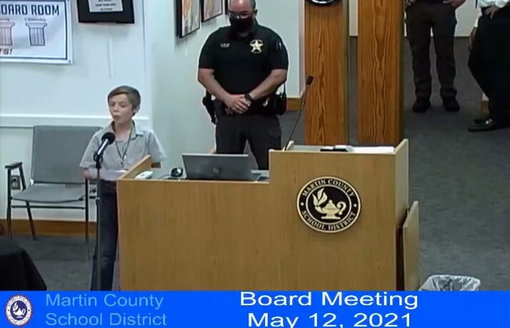 Click to enlarge school boy mask board meeting