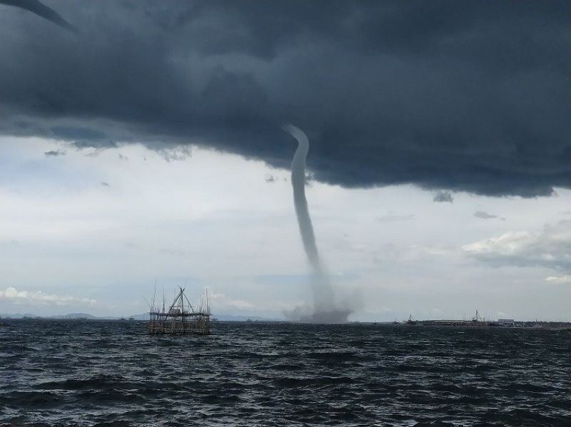 Click to enlarge A waterspout was seen over Bredco Port in Bacolod City Wednesday, May 18, 2021.