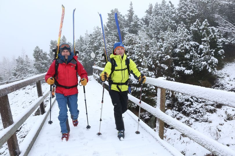 Click to enlarge Nick and Patrick Matheson, from Northumbria, went skiing at Cairngorm mountain, where fresh snow fell yesterday.