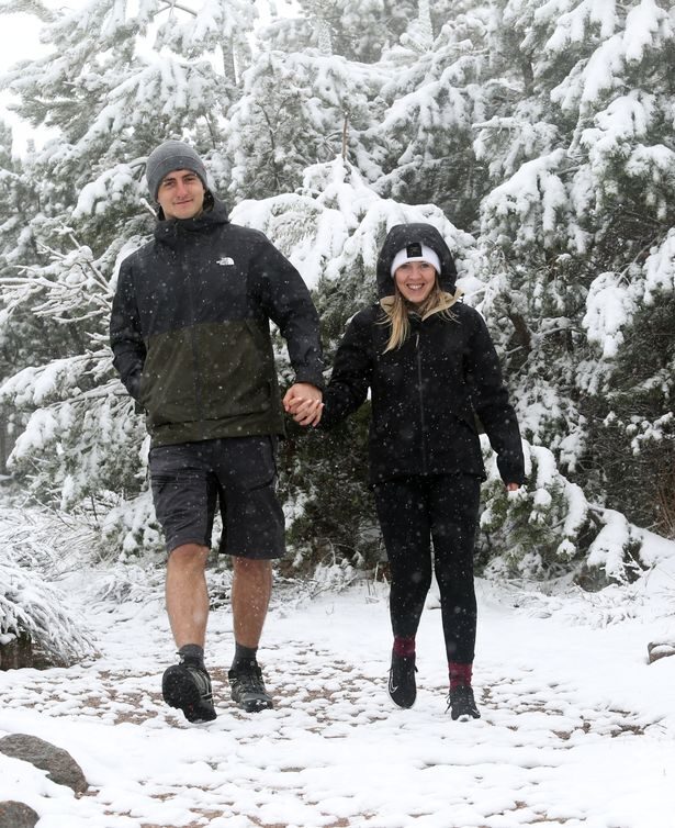 Srdjan Lulic and Catherine Stewart were surprised by yesterday's snowfall at Cairngorm National Park.