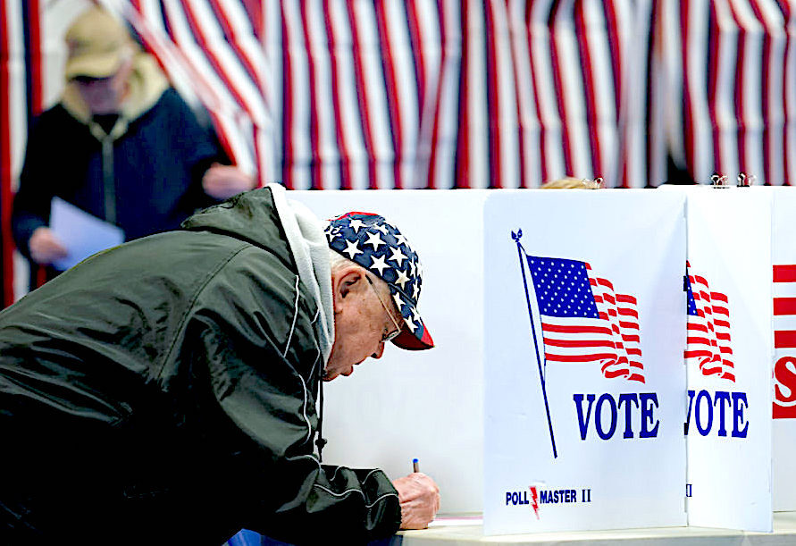 Click to enlarge man voting