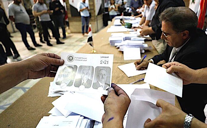 Click to enlarge Poll workers