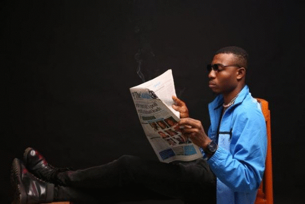 Man reading newspaper