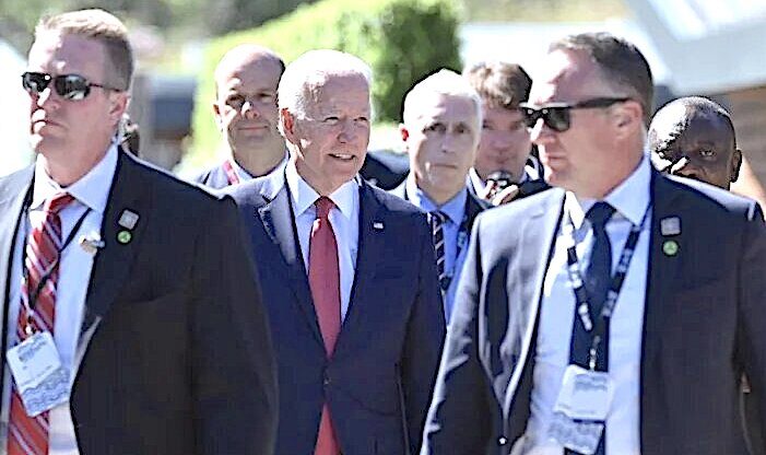 Biden surrounded