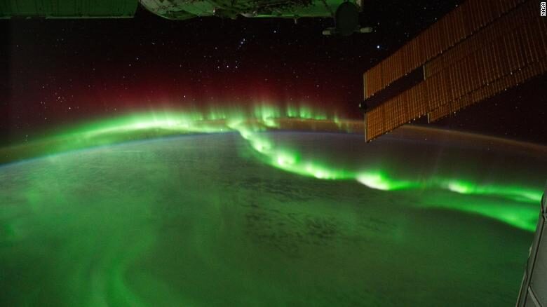 Click to enlarge aurora borealis space station