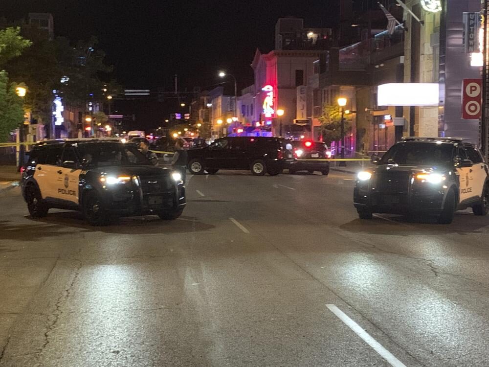 Click to enlarge Police vehicles block a street in Minneapolis