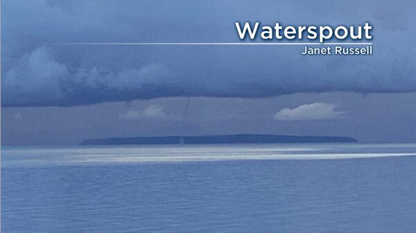 A waterspout and potentially two funnels clouds