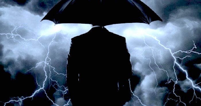 Man umbrella storm
