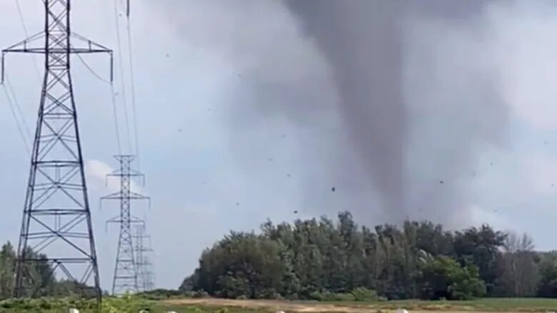 Click to enlarge A tornado was observed late Monday afternoon in Mascouche, Quebec