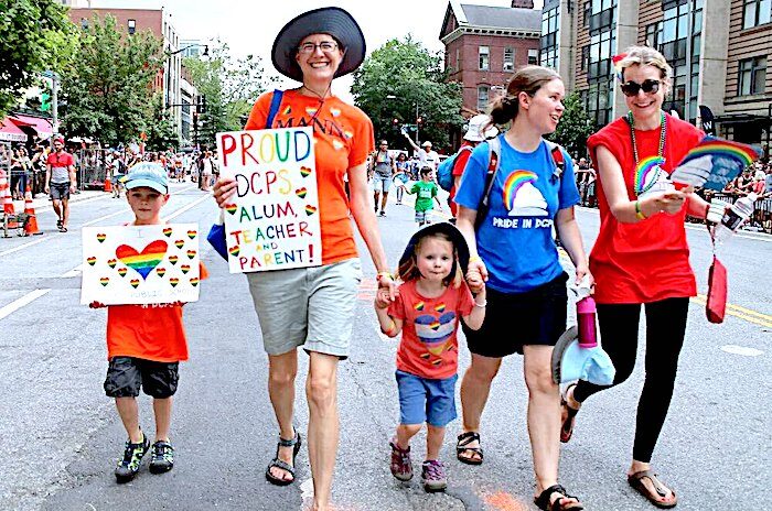Click to enlarge Parade participants w kids