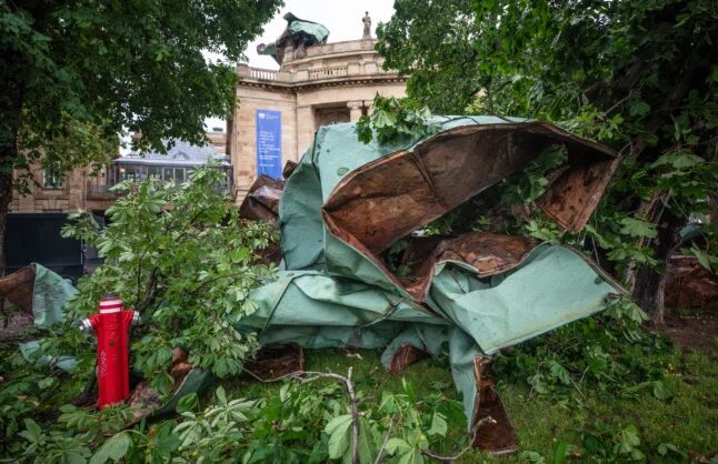 Cladding from the roof of Stuttgart State Opera lies on the ground