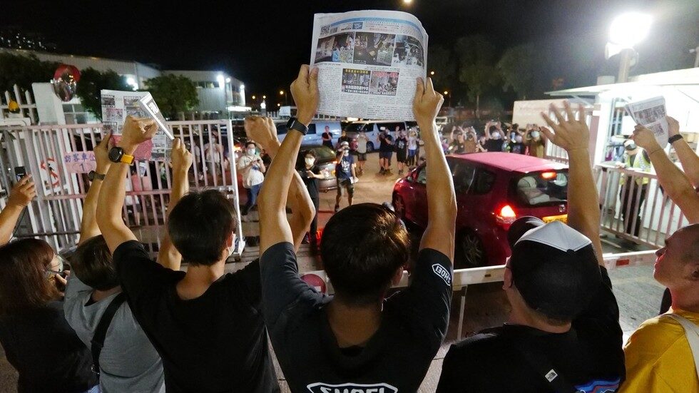 Click to enlarge Apple Daily journalists