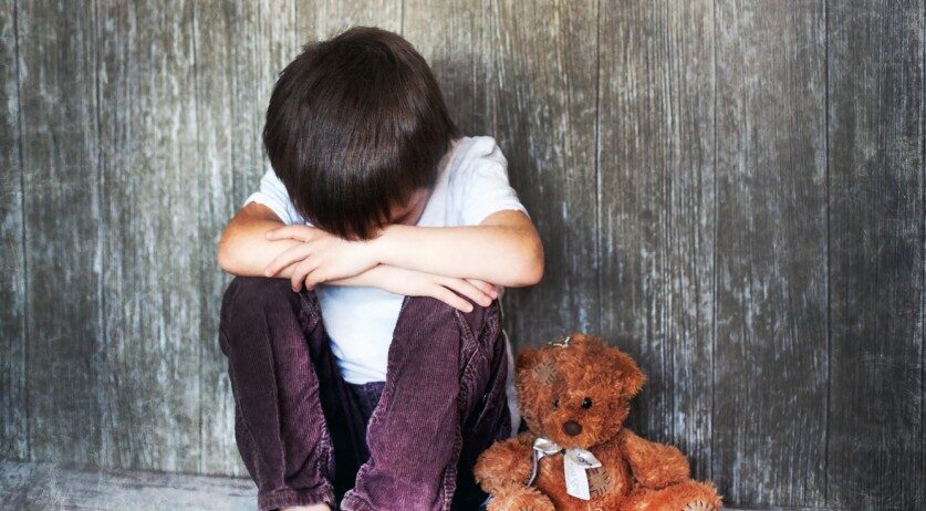 Click to enlarge Child with teddy bear