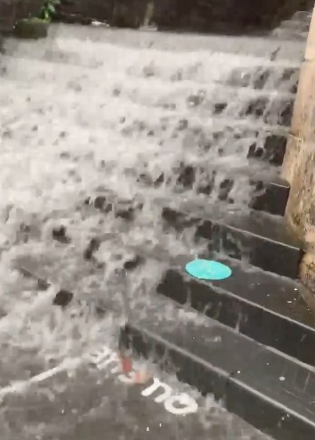 Click to enlarge Heavy rain on Princes Street causing flash flooding (