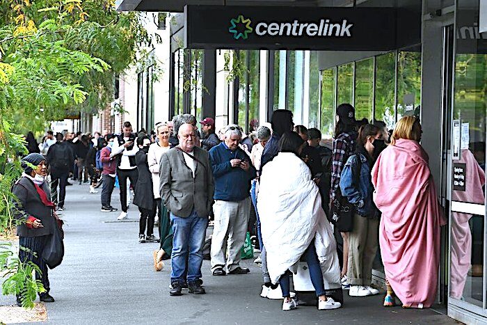 Click to enlarge people lined up centrelink