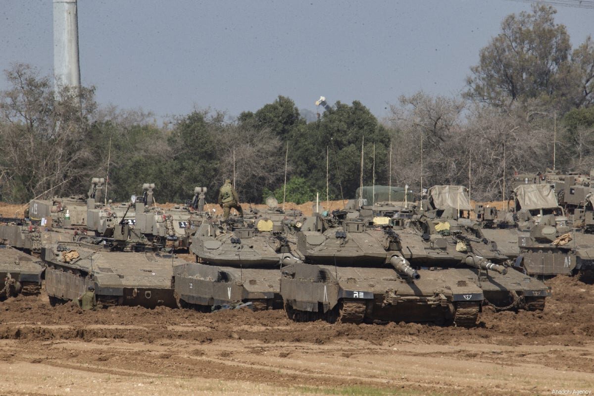 Click to enlarge israel tanks gasa border fence