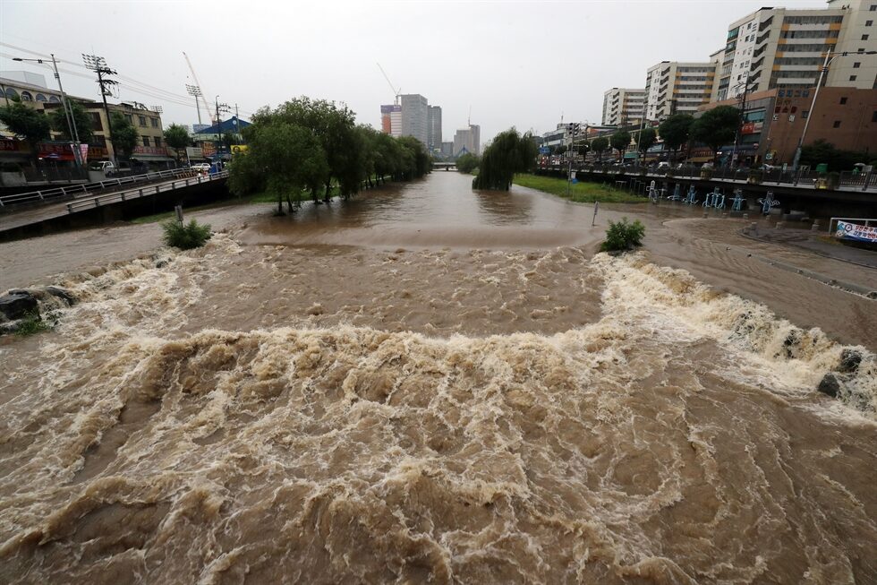 A pavement is inundated in Gwangju, July 6.