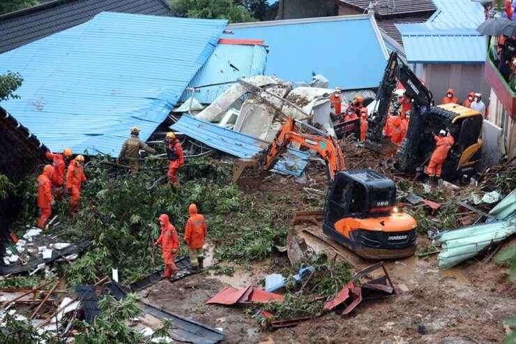 Click to enlarge Emergency responders conduct a rescue