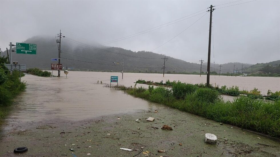 Click to enlarge A road is flooded in Haenam, South Jeolla Province, Tuesday, as heavy rainfall hit the region.