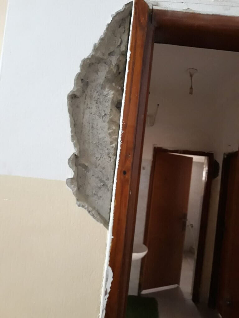 Click to enlarge destroyed door children center jenin Al Tafawk