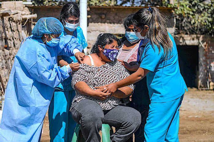 Peruvian woman vaccine