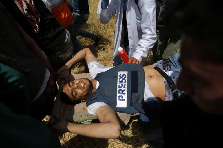 Click to enlarge Photographer Yaser Murtaja journalist killed israel great march of return