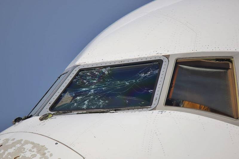 External view of the damaged flight deck windows.