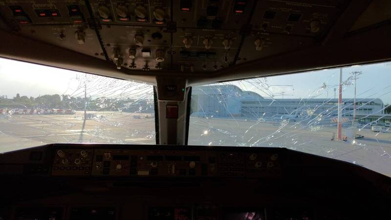 he storm was so strong that hail stones managed to crack the windscreen of the flight deck.