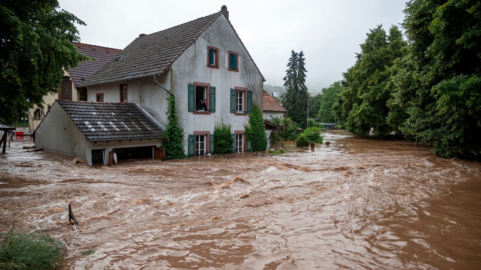 The Kyll river has overflowed its banks in Erdorf and flooded parts of the village