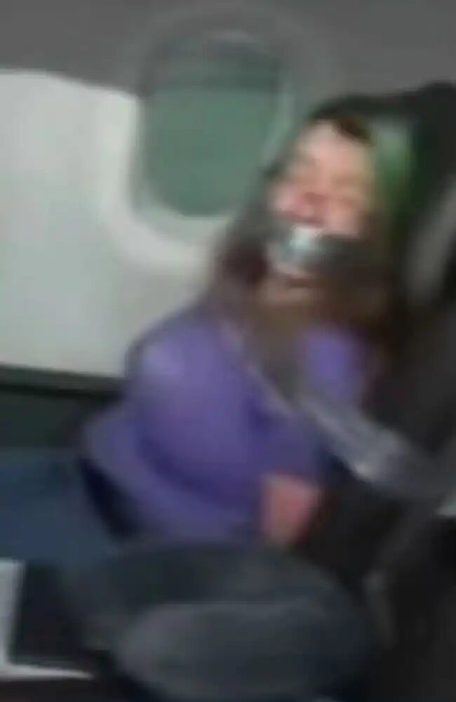 american airlines passenger duct taped