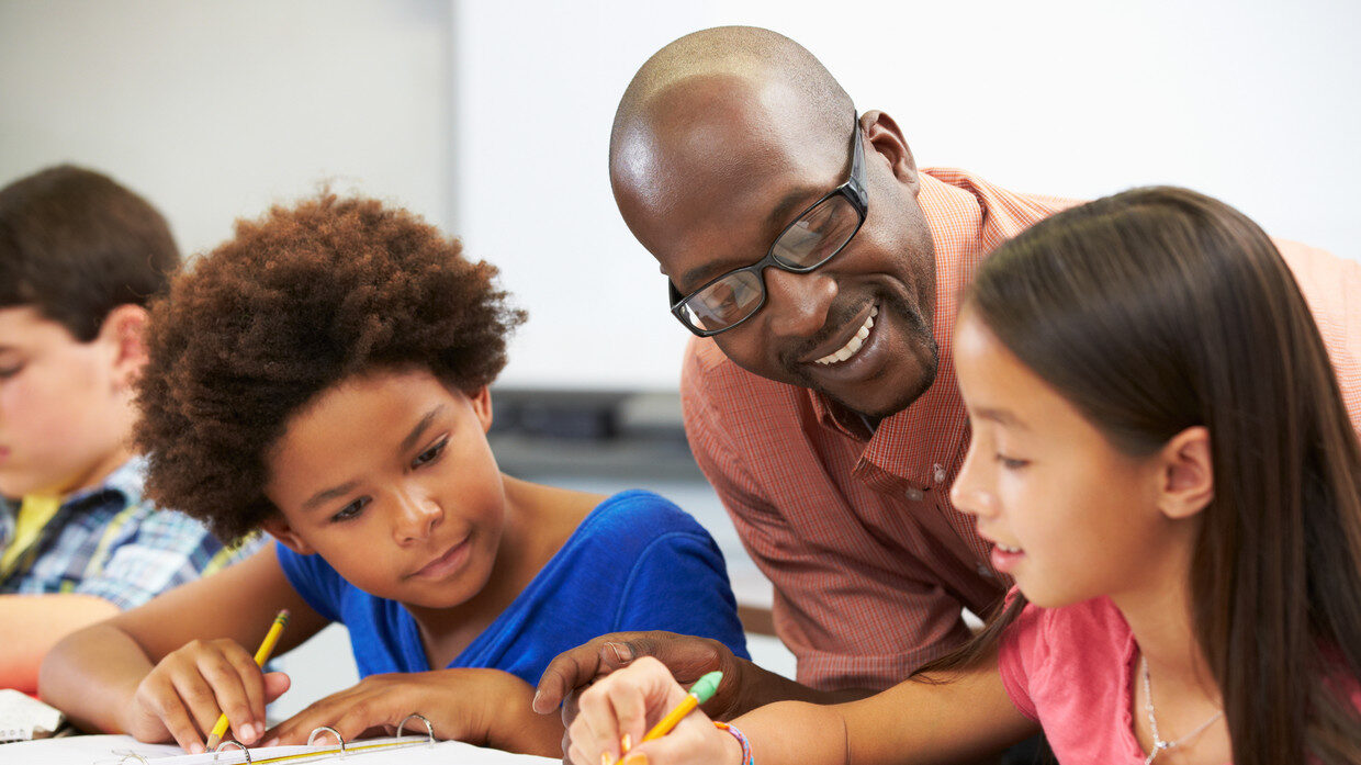 Click to enlarge teacher and students