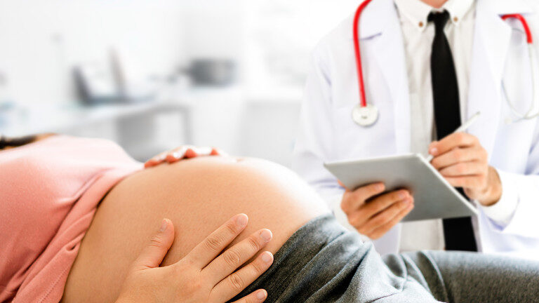 Click to enlarge pregnant doctor