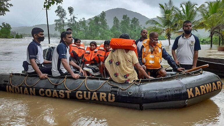 Indian Coast Guard officers conduct rescue ops in a flooded area in Karnataka's Uttara Kannada district