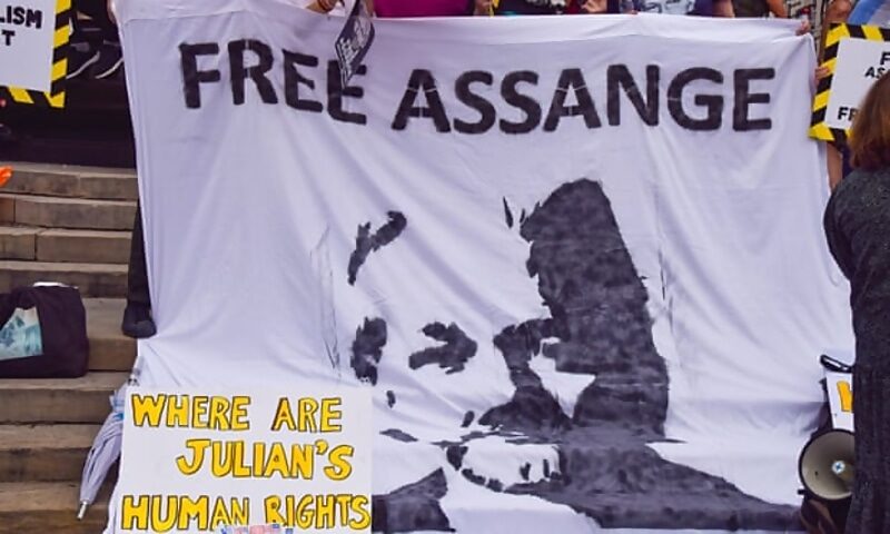 assange protest sign