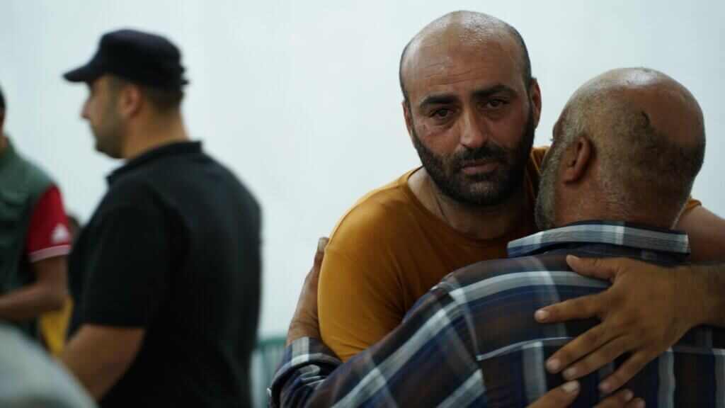 Click to enlarge father morns son shot israel