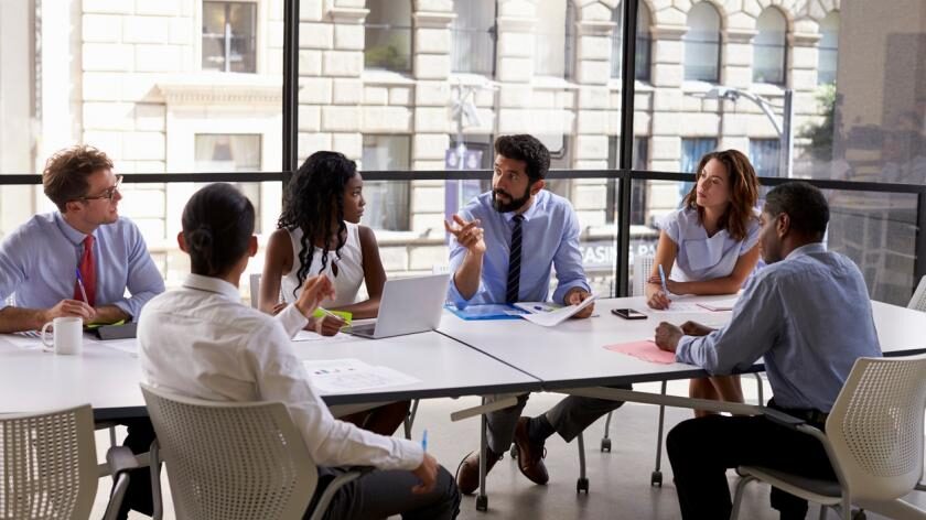 workplace meeting employees