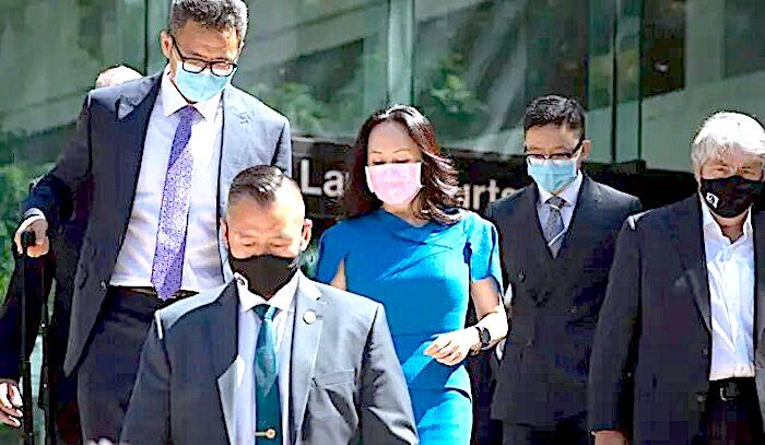 Meng Wanzhou escorted