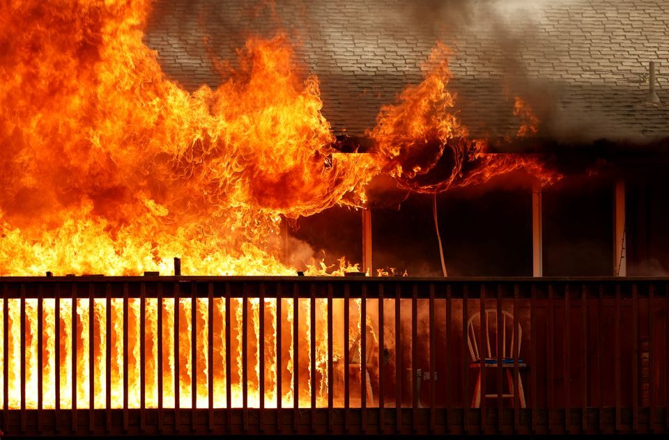 Click to enlarge Flames makes their way across the front deck of