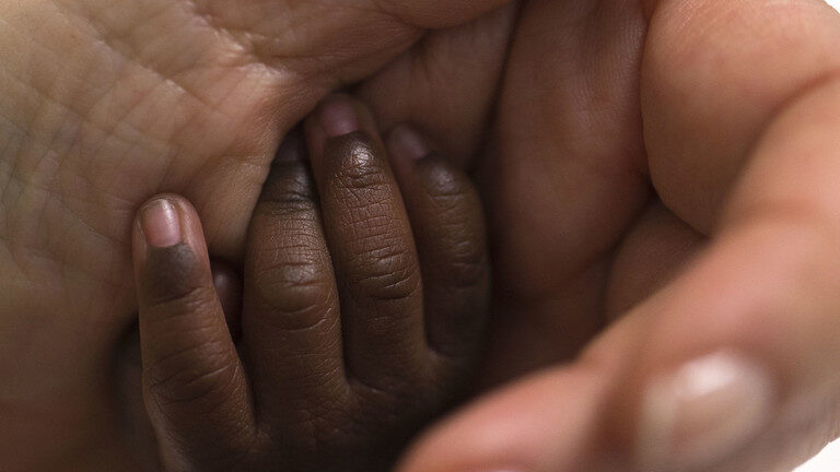 Click to enlarge baby hand parent child